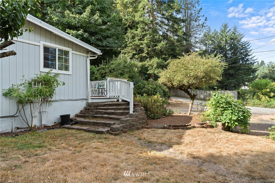 17415 Renton Issaquah Road Southeast Renton, WA 98059 - Photo 29 of 37 a view of a house with a yard