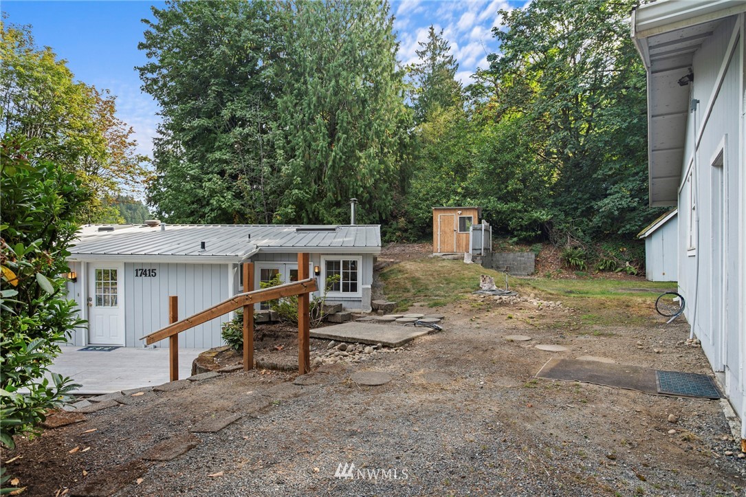 17415 Renton Issaquah Road Southeast Renton, WA 98059 - Photo 30 of 37 a view of a house with a yard
