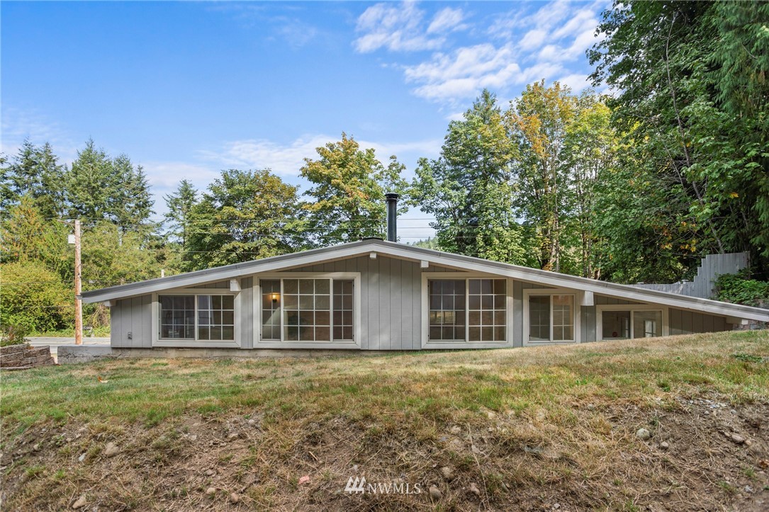 17415 Renton Issaquah Road Southeast Renton, WA 98059 - Photo 31 of 37 a house with trees in the background
