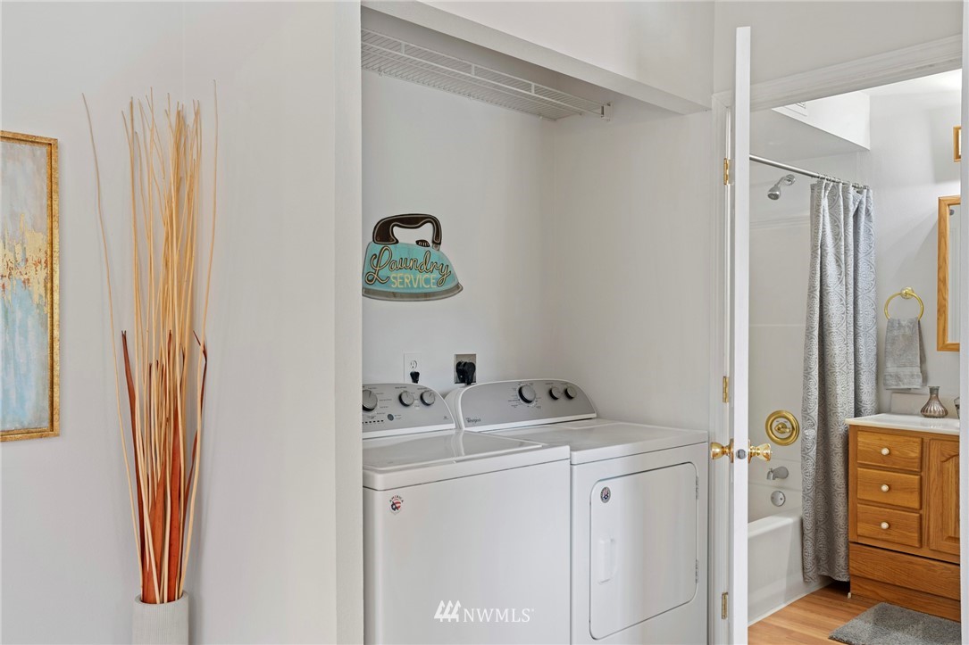 17415 Renton Issaquah Road Southeast Renton, WA 98059 - Photo 6 of 37 a utility room with dryer and washer