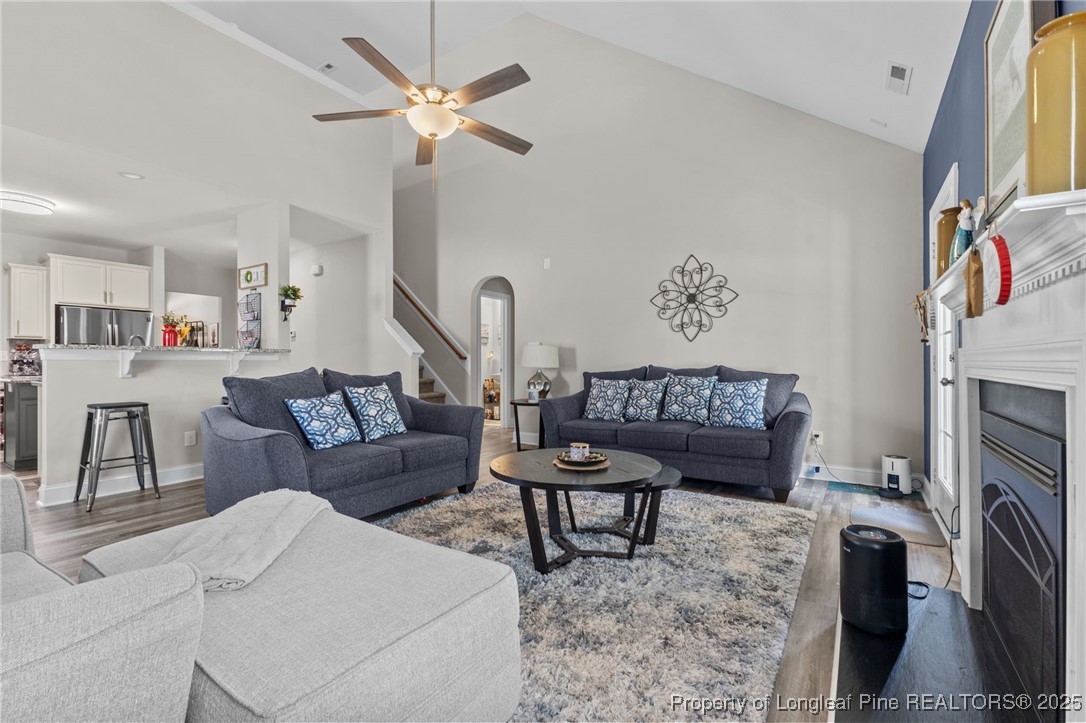 160 Huzzas Circle Cameron, NC 28326 - Photo 11 of 34 a living room with furniture and a fireplace