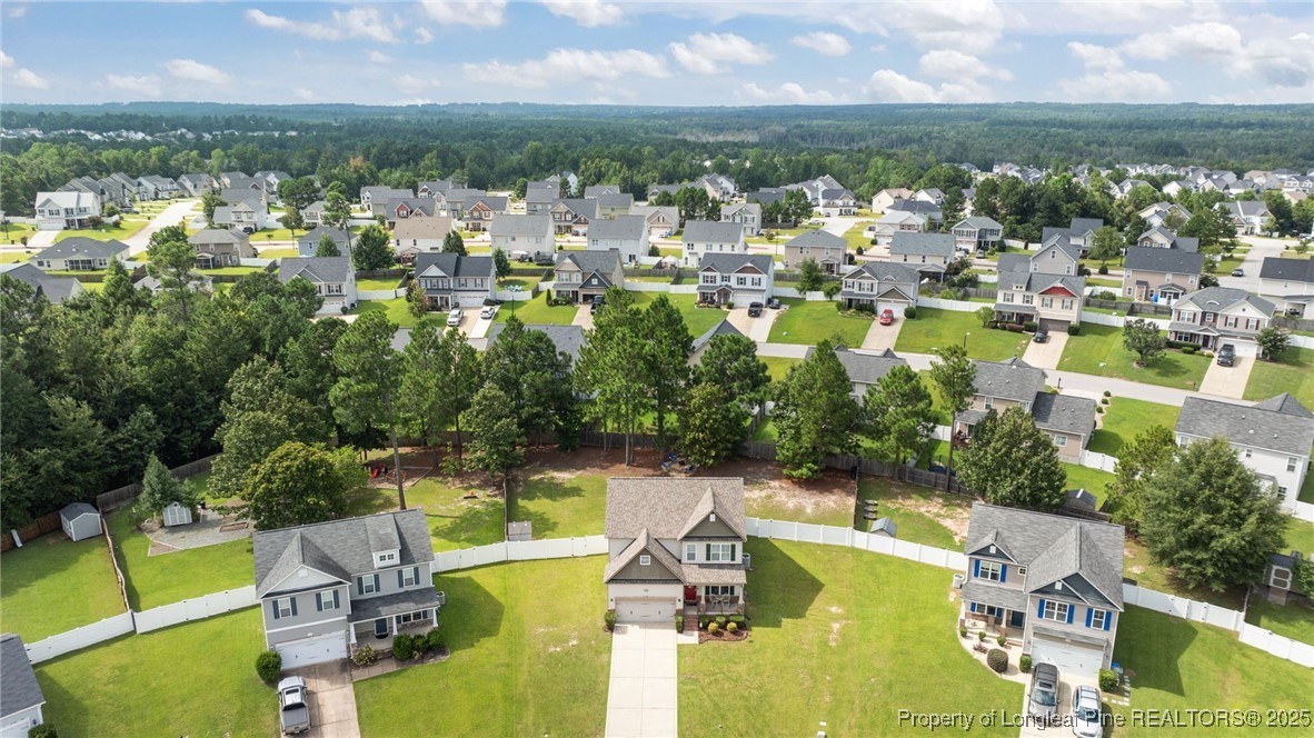 160 Huzzas Circle Cameron, NC 28326 - Photo 34 of 34 an aerial view of residential houses with outdoor space and swimming pool