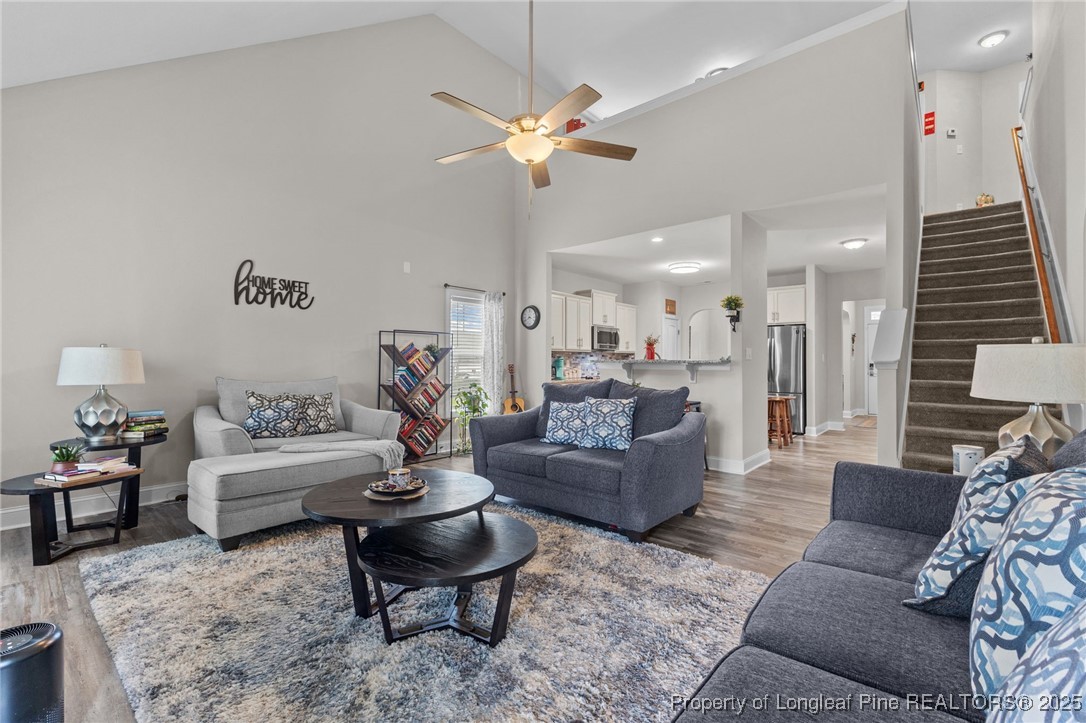160 Huzzas Circle Cameron, NC 28326 - Photo 9 of 34 a living room with furniture and a chandelier
