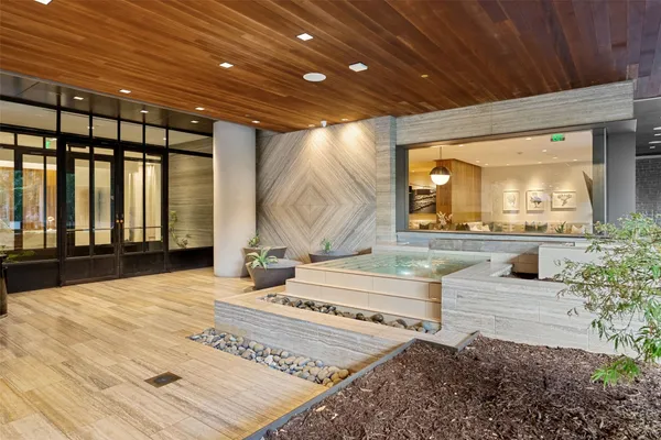 a view of a living room and entry way