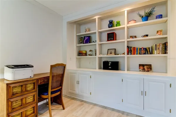 a bedroom with bed and a couch