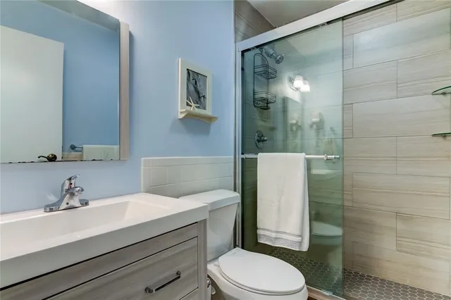 a view of a park with large trees