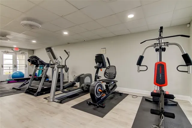 a view of tree in front of a yard