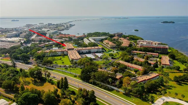 a view of living room with a cabinets and wooden floor