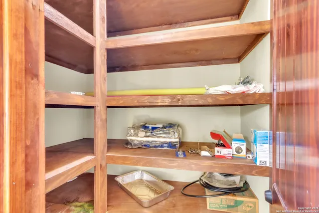 a room with lots of white furniture