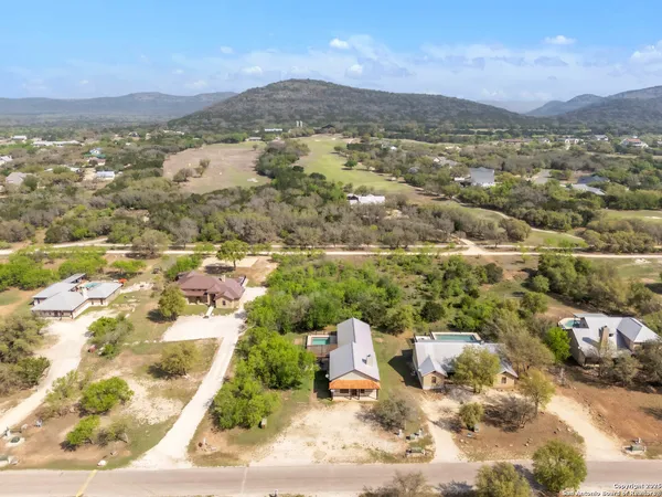 a view of a city with mountains in the background