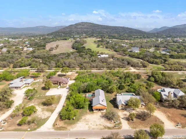 a view of a city with mountains in the background