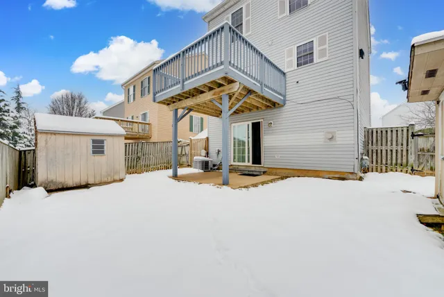 a view of a house with a flat outdoor space