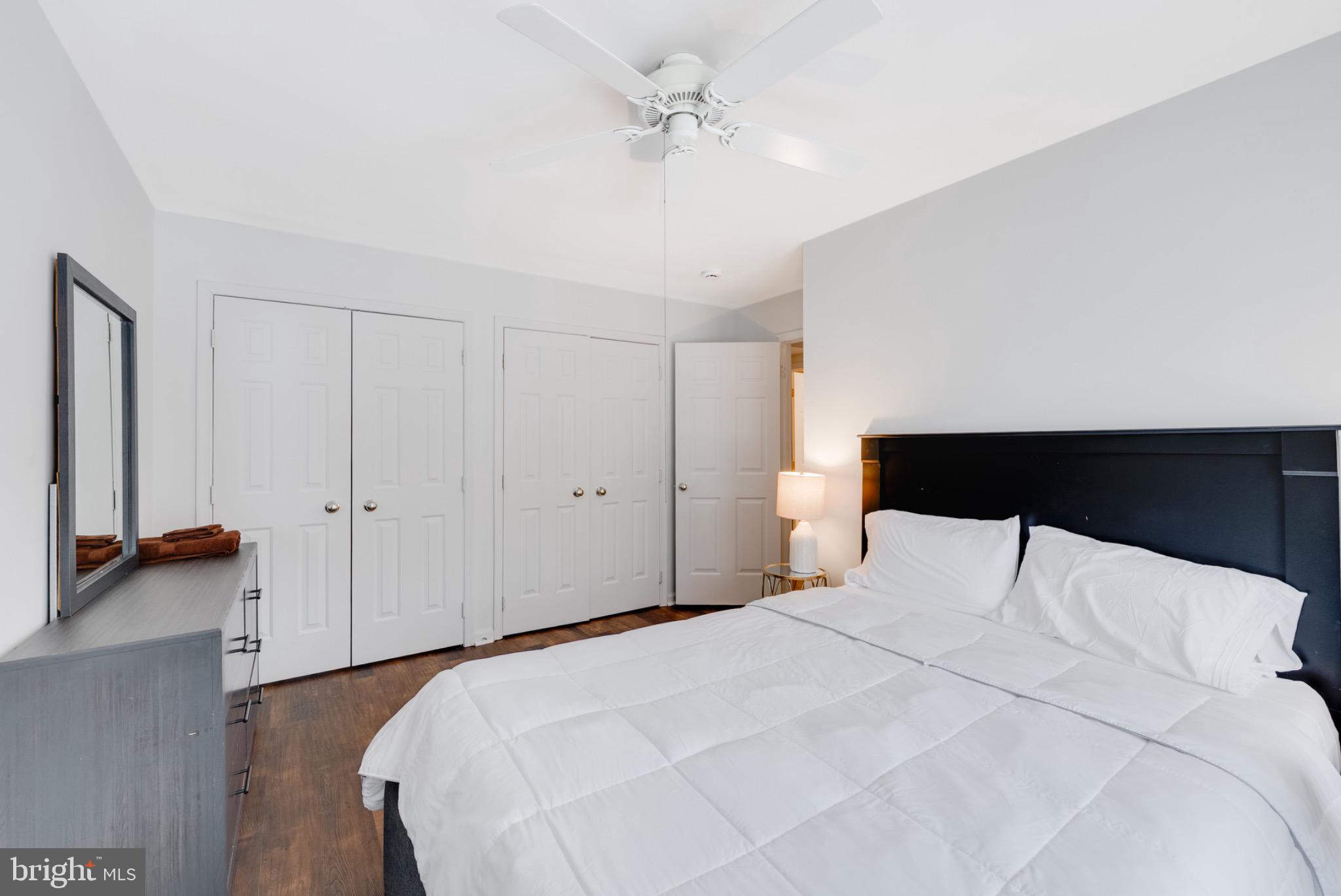 2 Knox Circle Southeast Washington, DC 20020 - Photo 5 of 25 a bedroom with a bed and a walk in closet