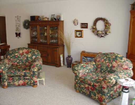 16521 Alexander Run Jupiter, FL 33478 - Photo 8 of 15 a bedroom with a bed and a dresser