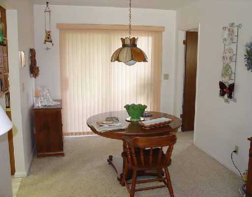 16521 Alexander Run Jupiter, FL 33478 - Photo 9 of 15 a dining room with furniture and window