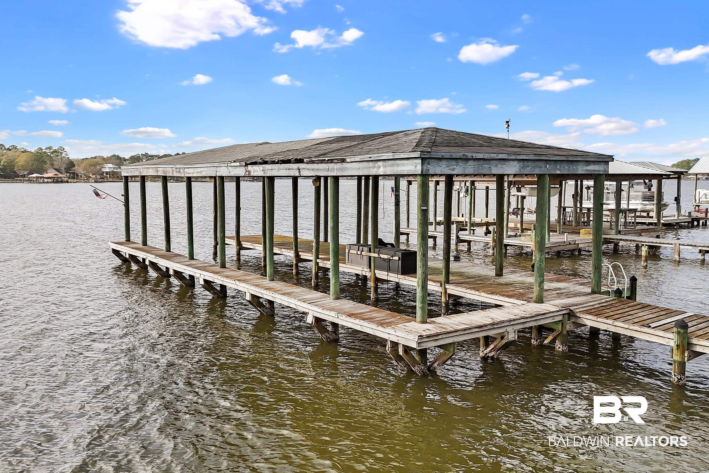 8591 Bay Harbor Road Elberta, AL 36530 - Photo 47 of 56 Dock area with boat lift and a water view