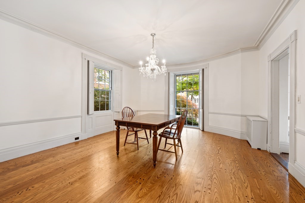 29 Follen Street Cambridge, MA 02138 - Photo 12 of 32 a view of a dining room with furniture and wooden floor