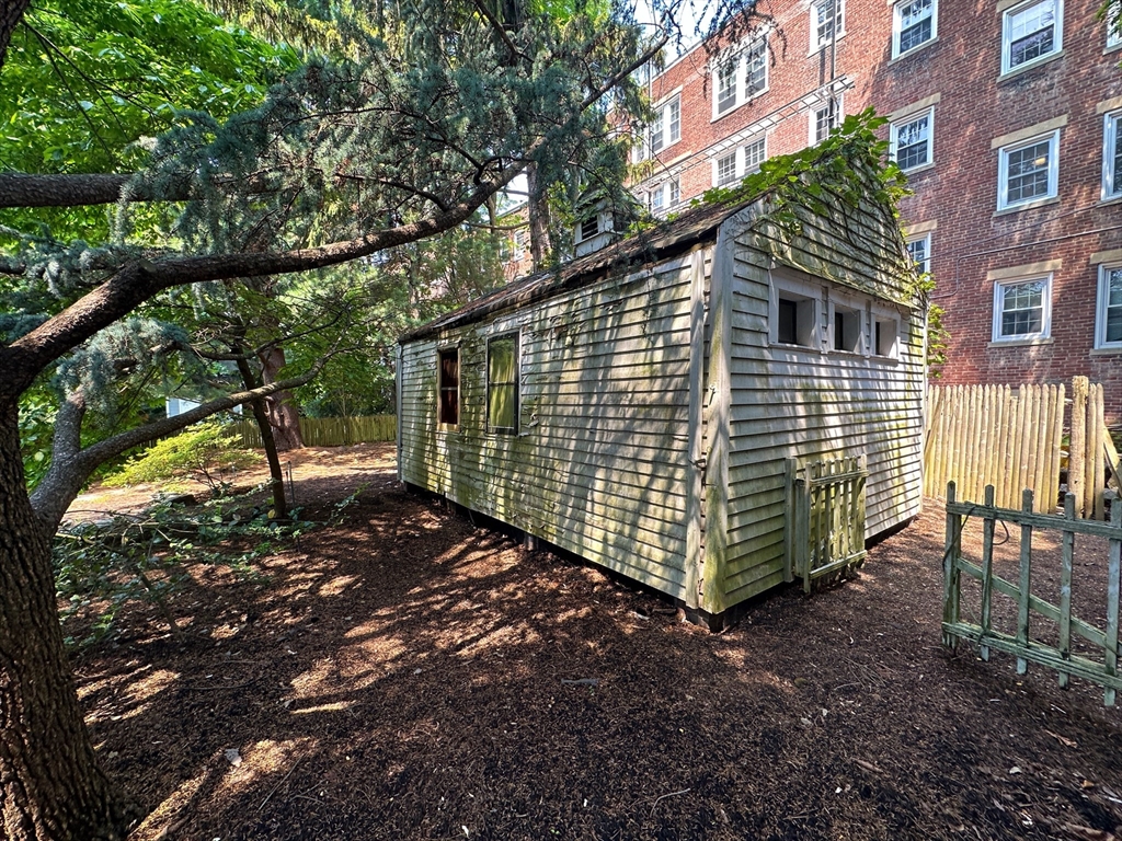 29 Follen Street Cambridge, MA 02138 - Photo 28 of 32 a view of a house with a yard