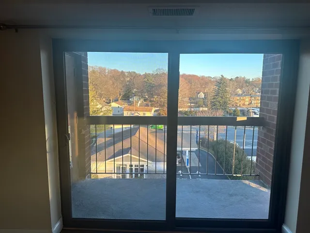 a view of a glass door with a from a window
