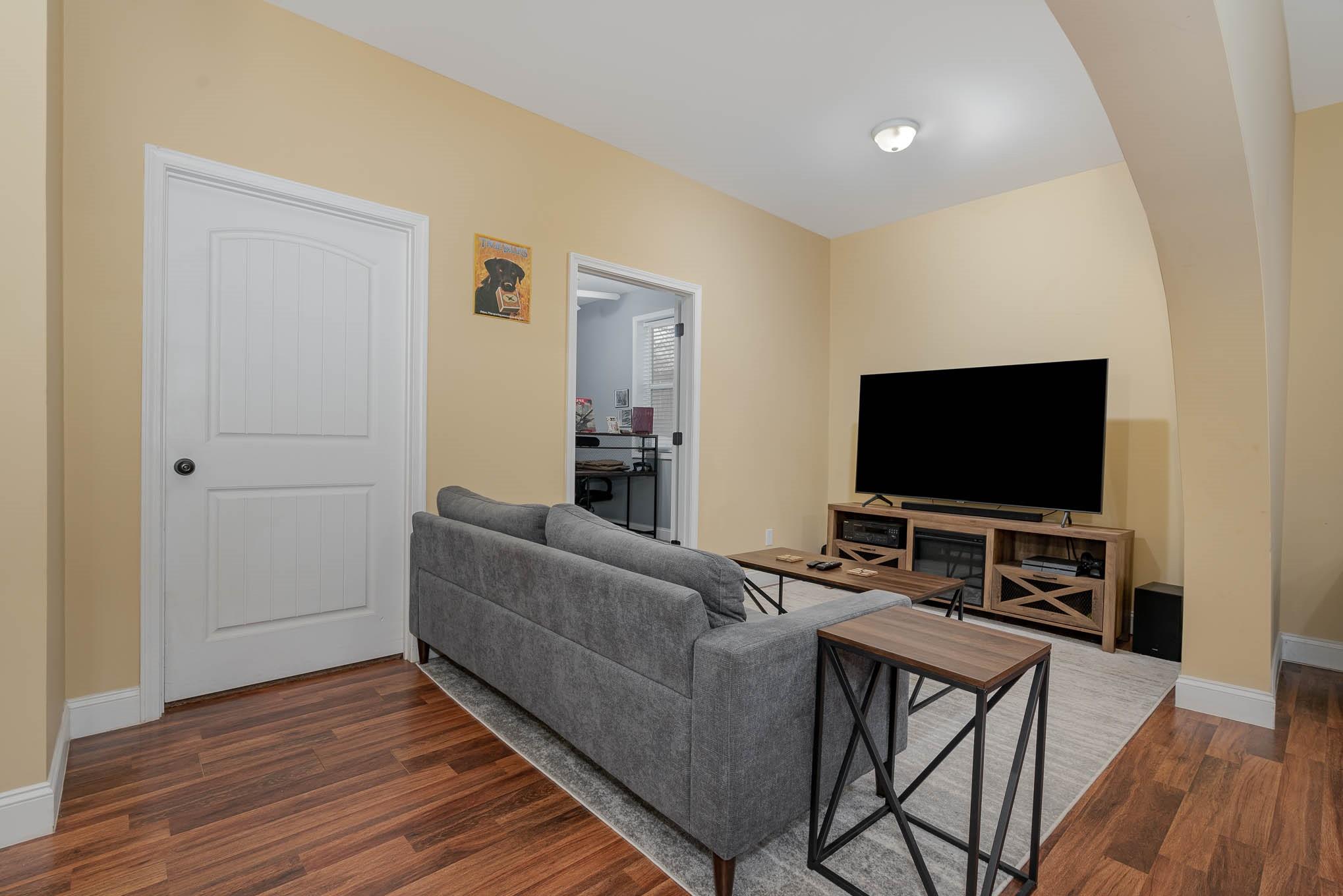 740 Shannon Meadow Road Clover, SC 29710 - Photo 5 of 31 a living room with furniture and a flat screen tv