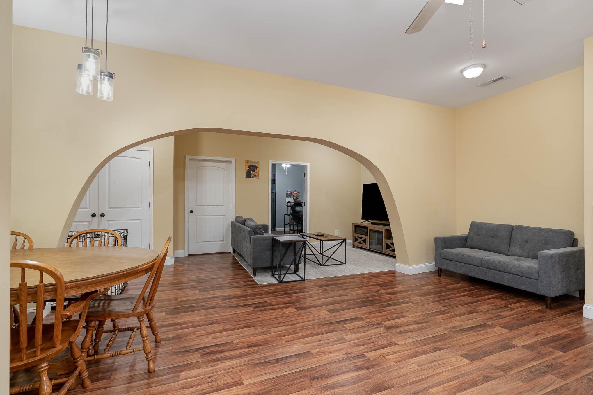 740 Shannon Meadow Road Clover, SC 29710 - Photo 8 of 31 a living room with furniture and a wooden floor