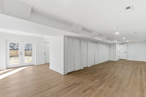 a view of an empty room and window