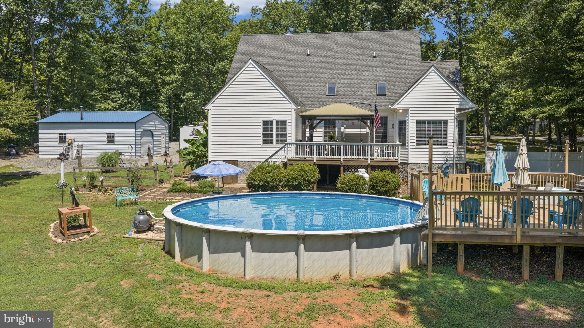 621 Ridgemont Drive Louisa, VA 23093 - Photo 52 of 81 Rear Exterior and pool