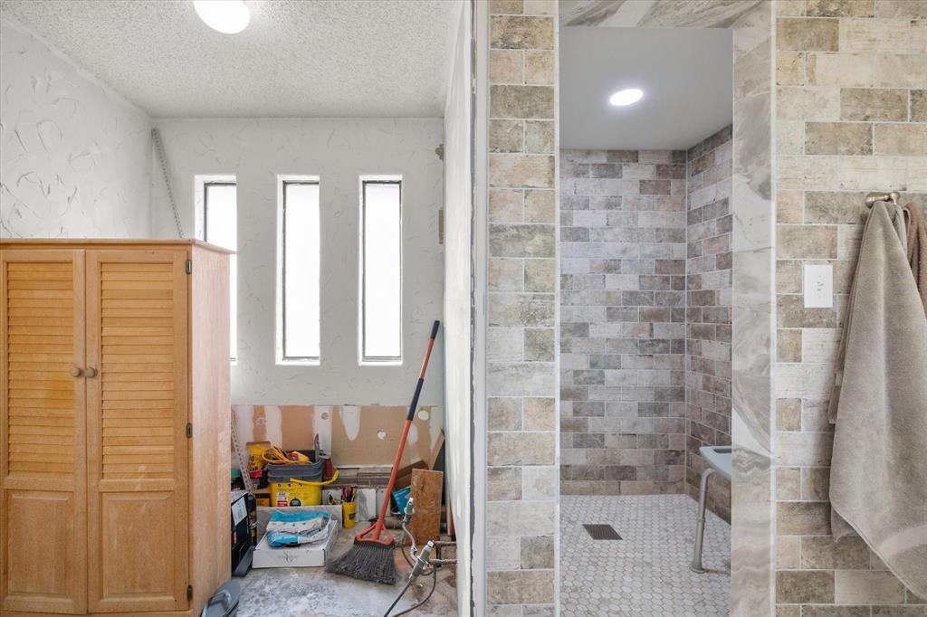 3748 Old Fort Worth Road Midlothian, TX 76065 - Photo 40 of 40 This bath goes on forever, and notice on the floor plan how there are SEPARATE mirroring his and her walk in closets. :-)