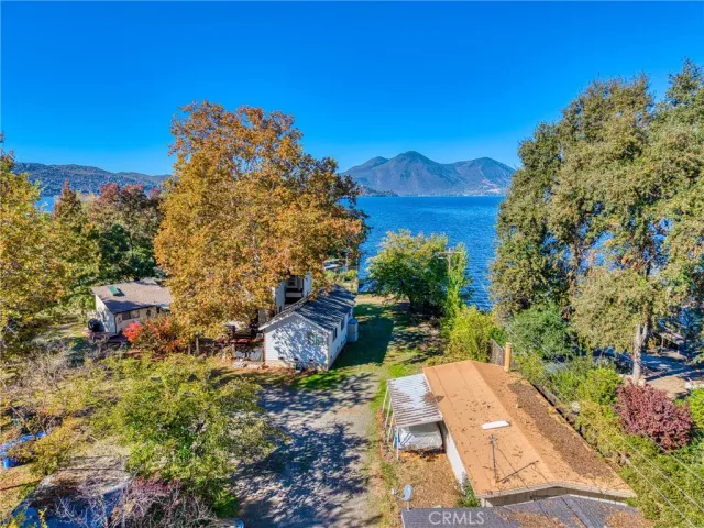 a view of a pathway with a yard