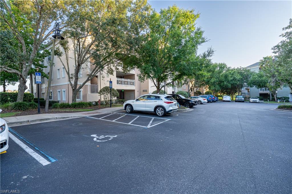 1362 Centre Ct Ridge Drive, Unit 101 Reunion, FL 34747 - Photo 2 of 25 View of parking / parking lot