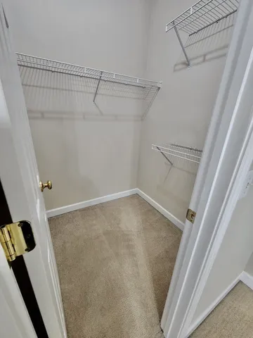 a view of a room with racks on the wall