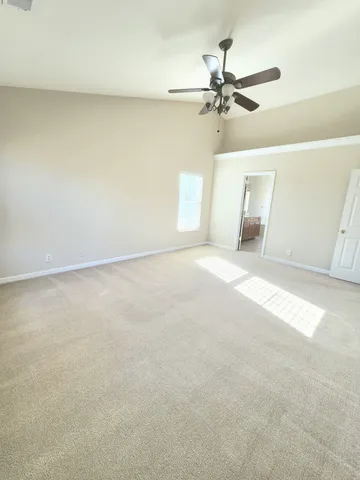 a view of a hallway with staircase