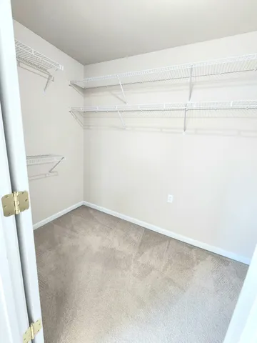 a view of a room with racks on the wall