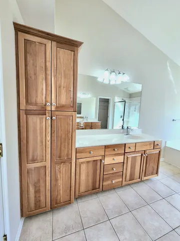 a room with a bed and window