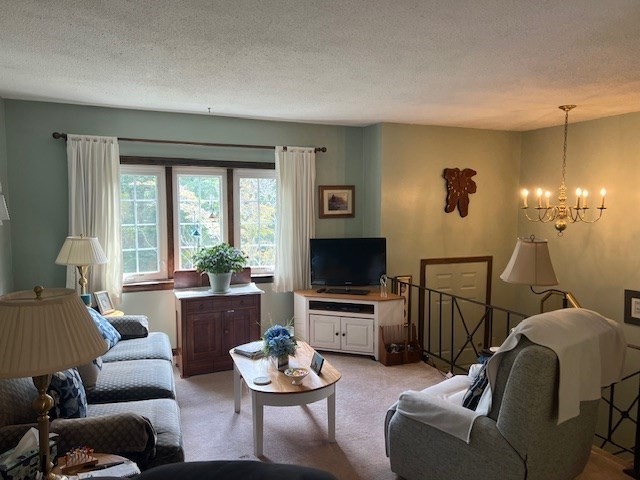 178 Walnut Street Barnstable, MA 02601 - Photo 3 of 12 a living room with furniture and a flat screen tv
