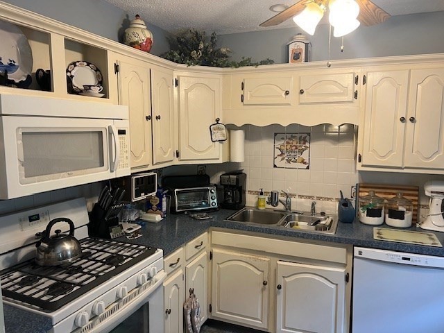 178 Walnut Street Barnstable, MA 02601 - Photo 4 of 12 a kitchen with white cabinets and appliances