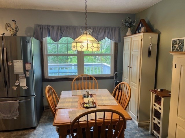 178 Walnut Street Barnstable, MA 02601 - Photo 5 of 12 a view of a dining room with furniture window and outside view