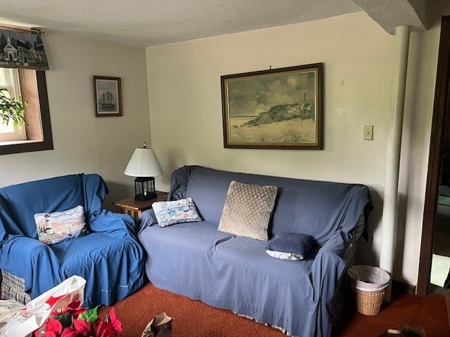 178 Walnut Street Barnstable, MA 02601 - Photo 9 of 12 a bedroom with furniture and wooden floor