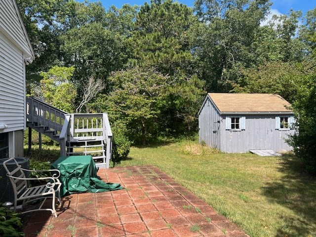 178 Walnut Street Barnstable, MA 02601 - Photo 10 of 12 a view of a house with a yard