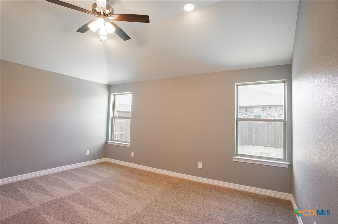3221 Digby Drive Belton, TX 76513 - Photo 11 of 30 an empty room with windows and fan
