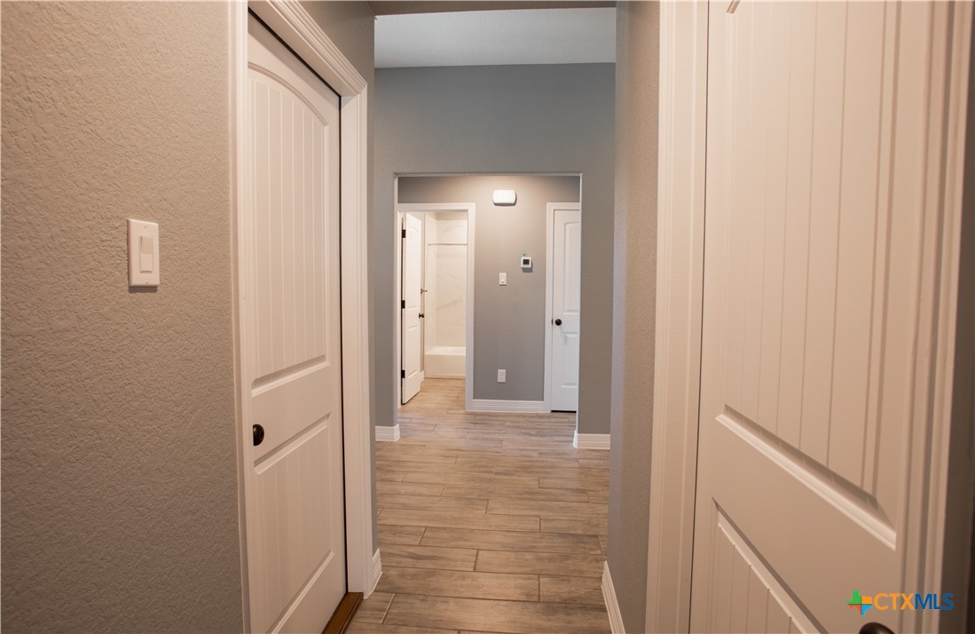3221 Digby Drive Belton, TX 76513 - Photo 24 of 30 a view of a hallway with wooden floor