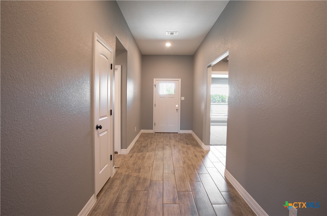 3221 Digby Drive Belton, TX 76513 - Photo 26 of 30 a view of a hallway with wooden floor