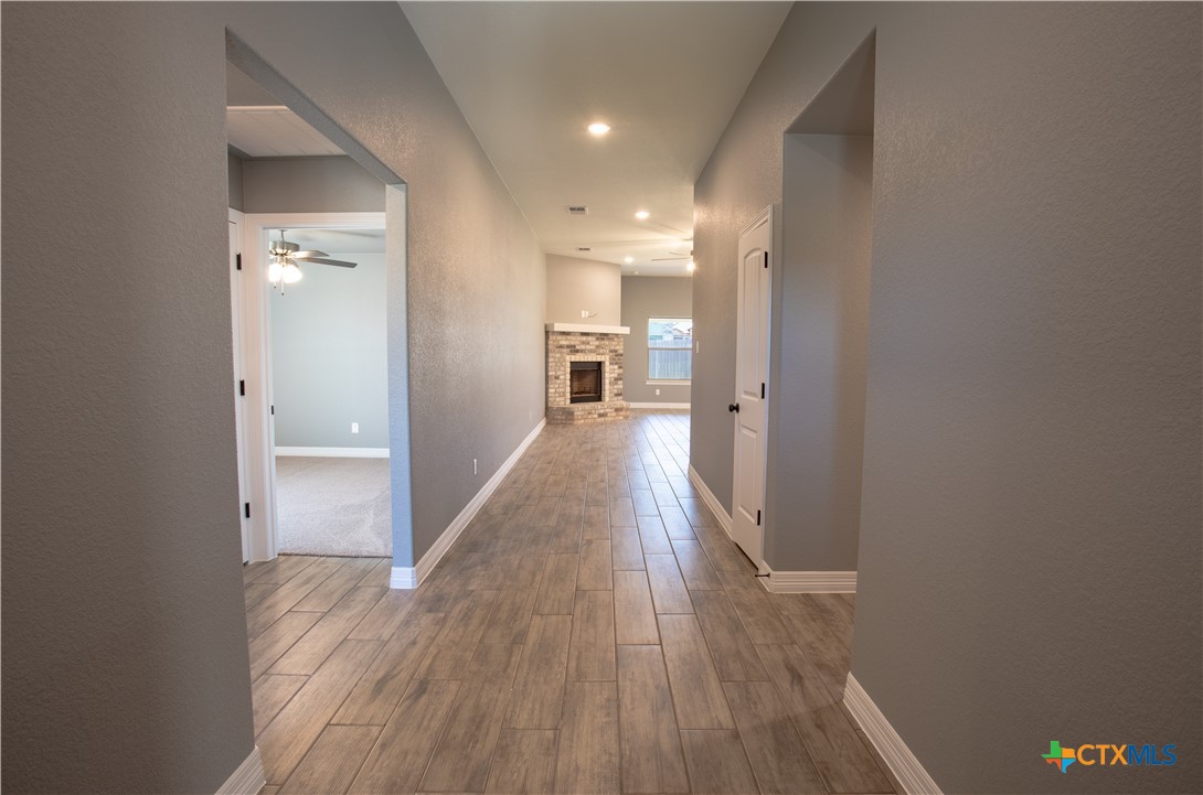 3221 Digby Drive Belton, TX 76513 - Photo 10 of 30 a view of a hallway with wooden floor