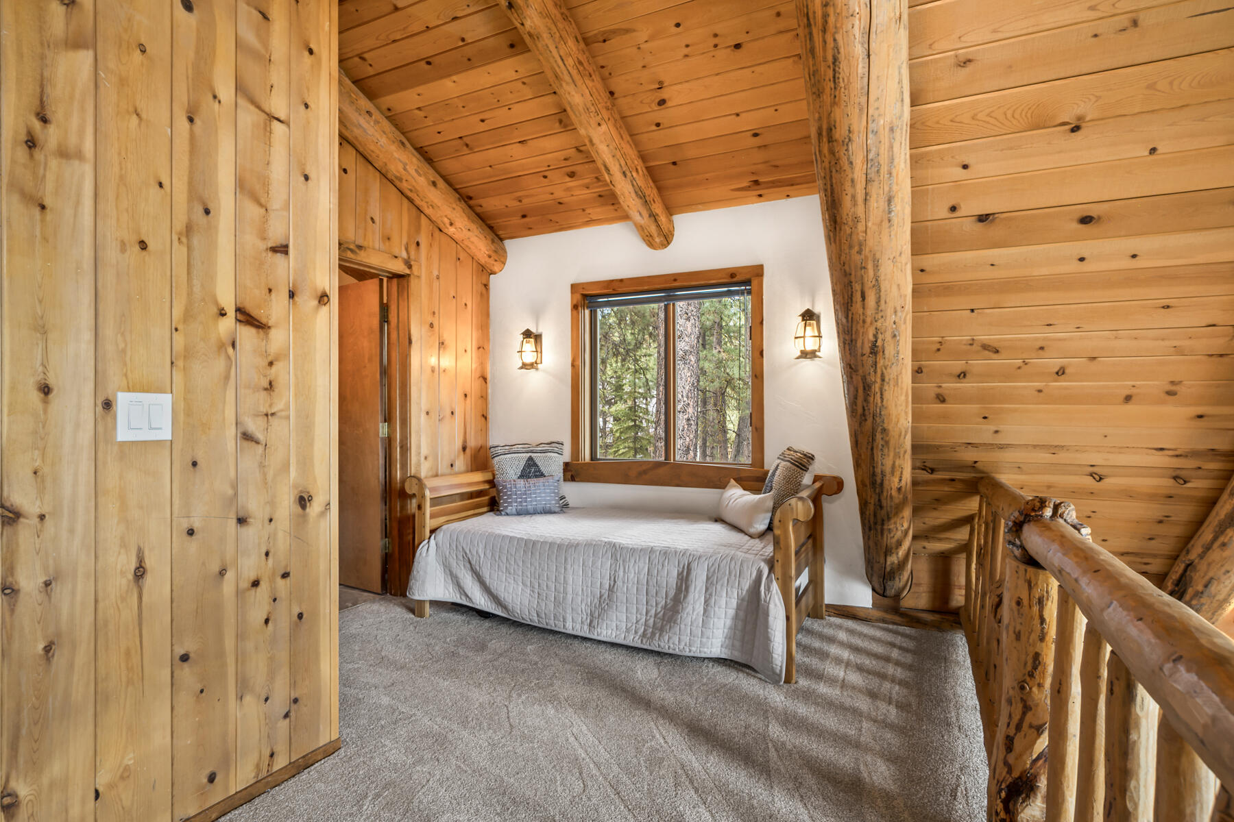 17026 Sharp Drive Bend, OR 97707 - Photo 39 of 72 a bedroom with a bed and a mirror