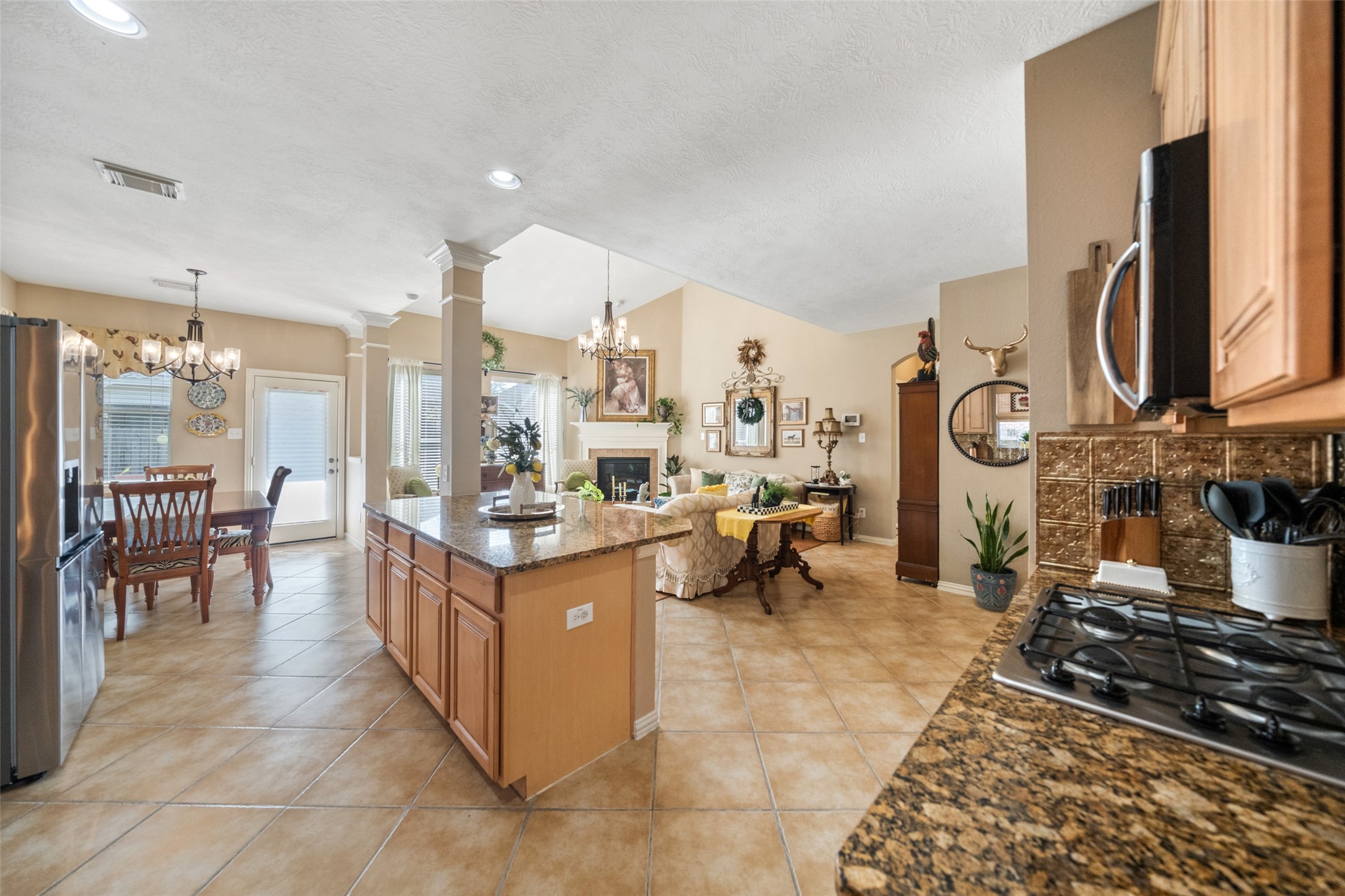 14422 Andrews Ridge Lane Humble, TX 77396 - Photo 15 of 40 a kitchen with stainless steel appliances granite countertop a stove and a sink