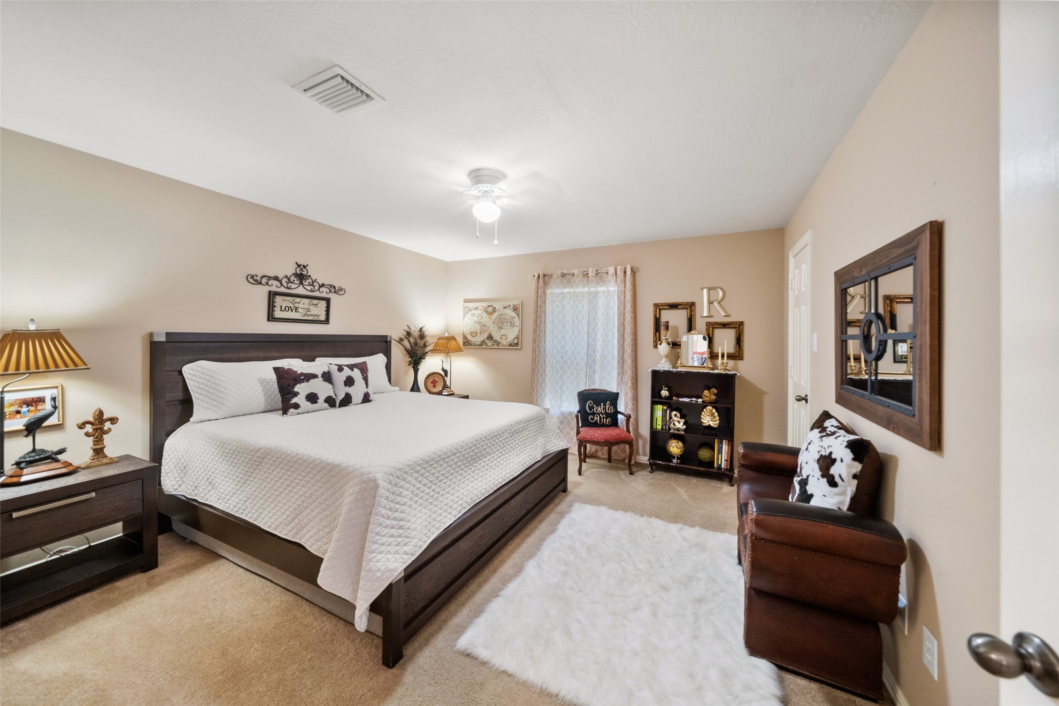 14422 Andrews Ridge Lane Humble, TX 77396 - Photo 30 of 40 a bedroom with a bed and furniture