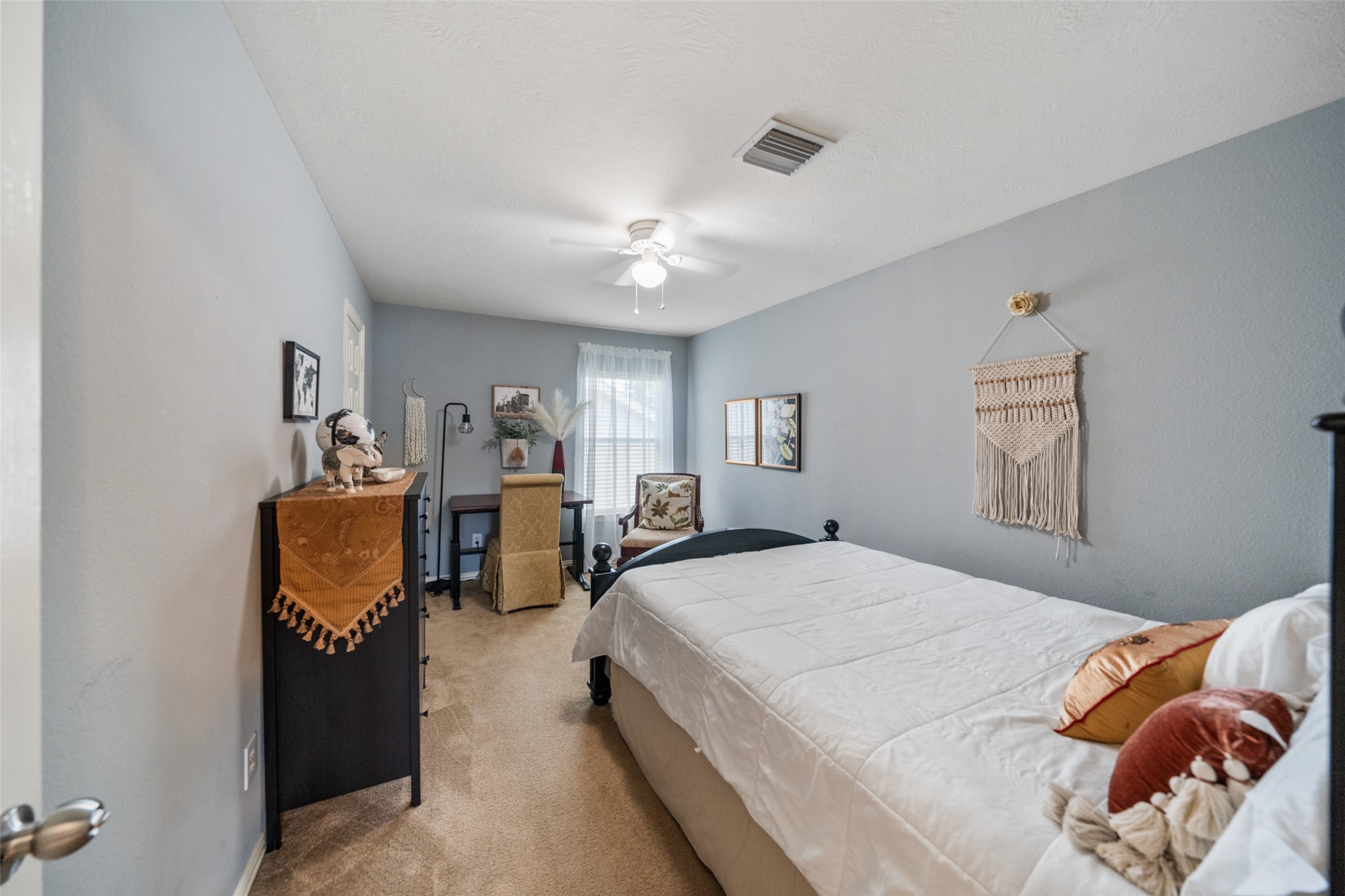 14422 Andrews Ridge Lane Humble, TX 77396 - Photo 32 of 40 a bedroom with bed and window