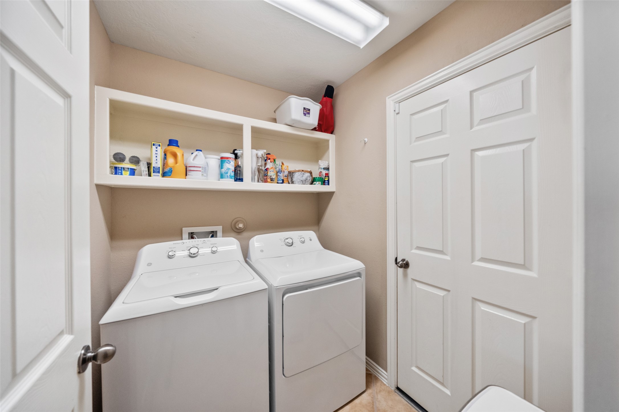 14422 Andrews Ridge Lane Humble, TX 77396 - Photo 35 of 40 a utility room with dryer and washer