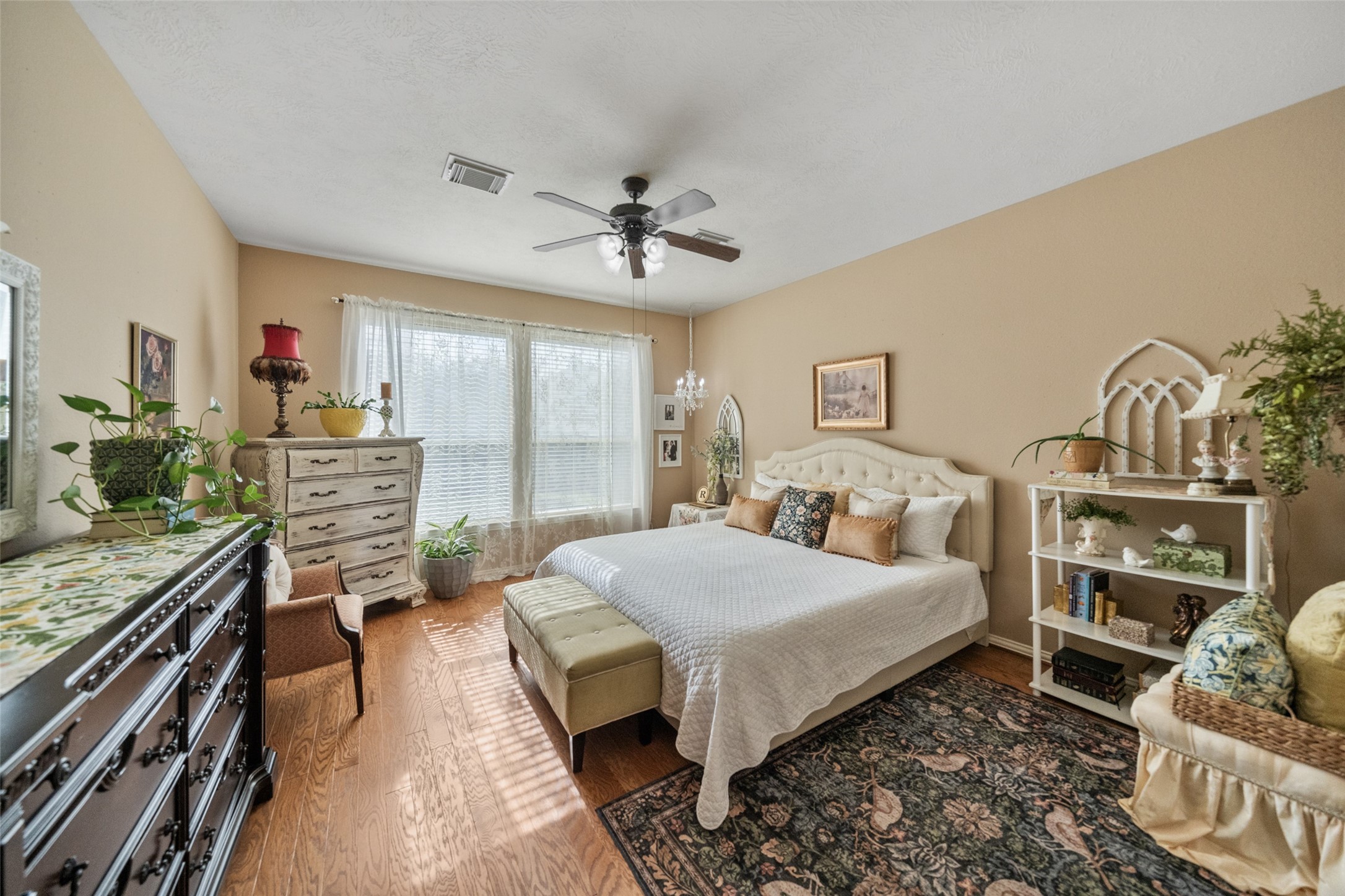 14422 Andrews Ridge Lane Humble, TX 77396 - Photo 5 of 40 a bedroom with a bed and a flat screen tv