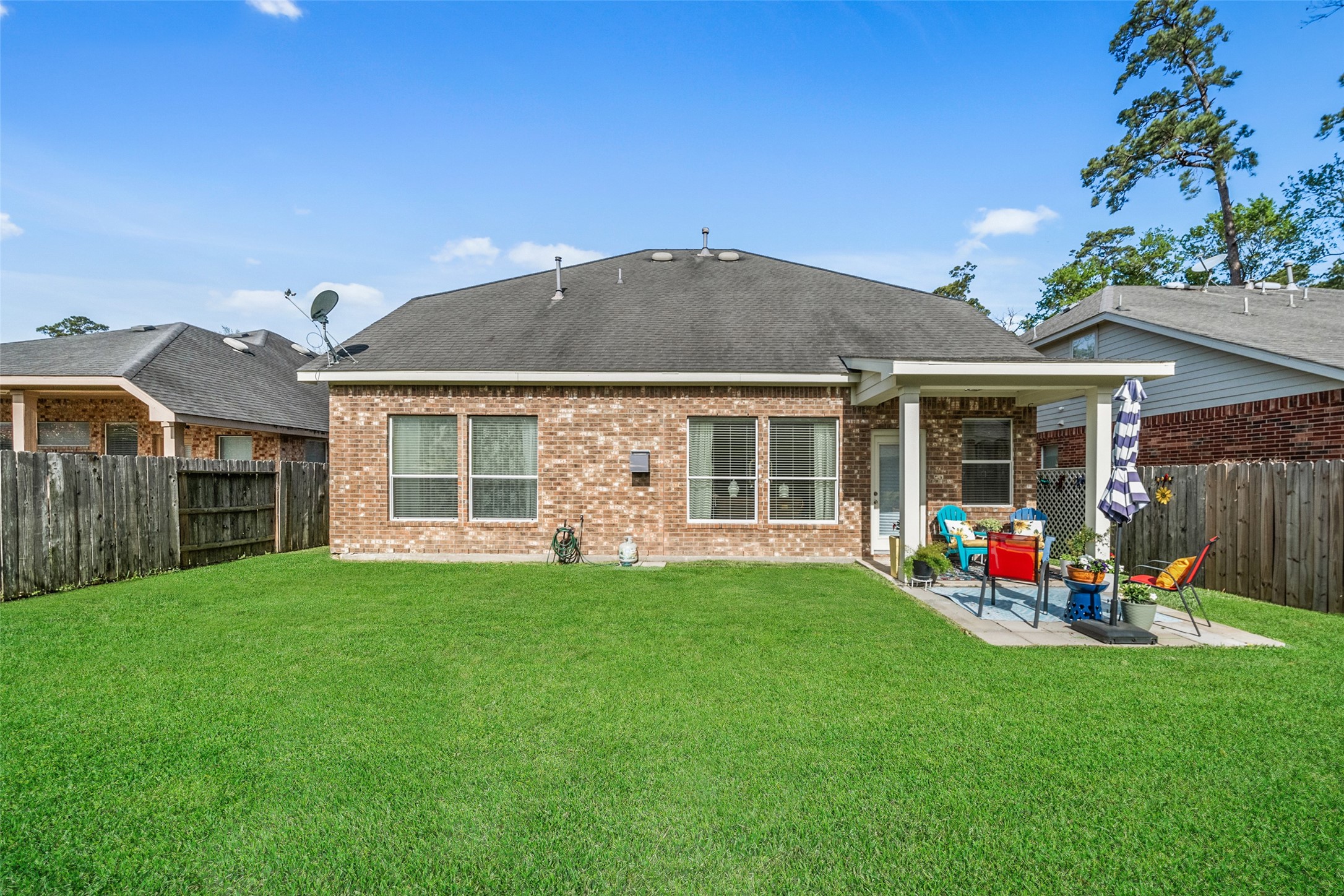 14422 Andrews Ridge Lane Humble, TX 77396 - Photo 9 of 40 a front view of house with yard and outdoor seating